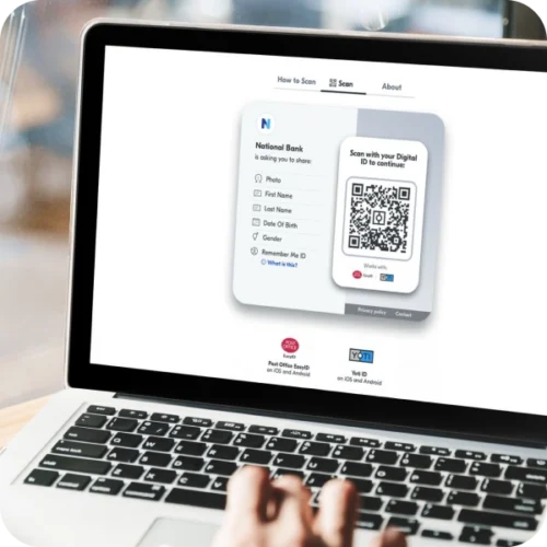 Laptop screen showing digital ID web share QR code for user to share details with bank