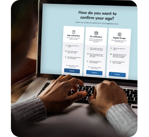 Person on laptop selecting their age verification method from a choice of facial age estimation, id age check, and digital ID app