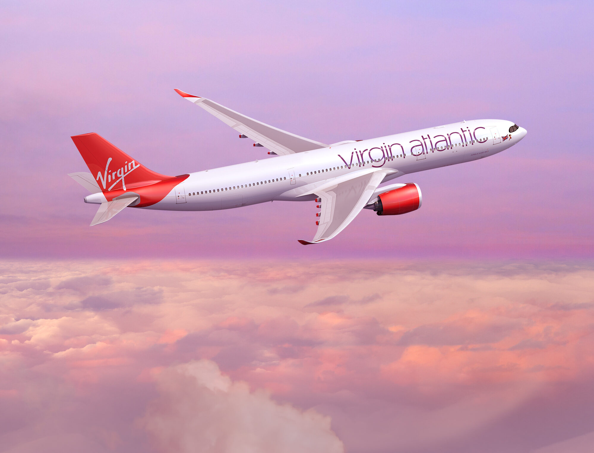 Virgin atlantic plane flying through the sky