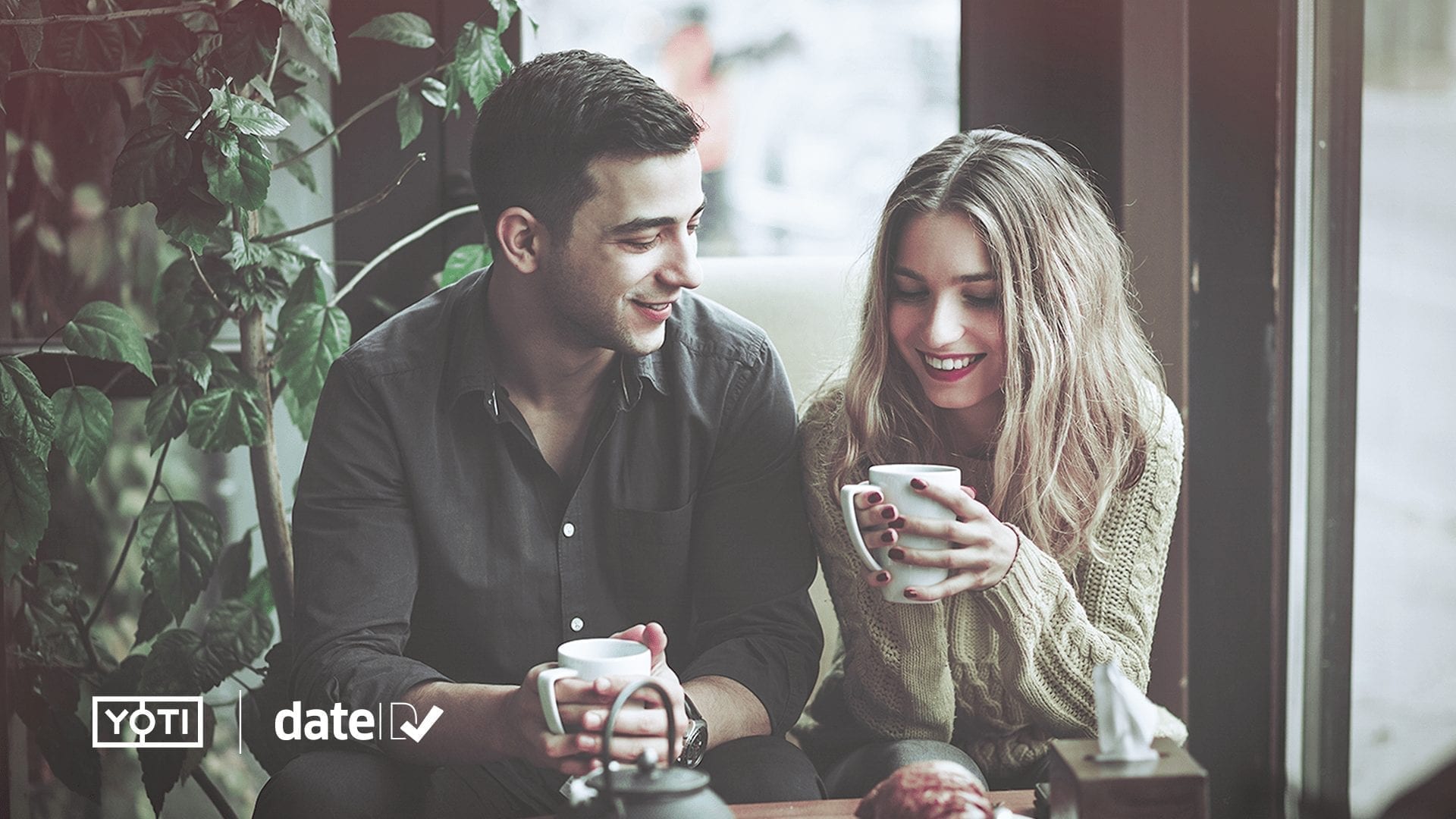 Two young adults on a coffee date, overlayed with yoti and DateID logos
