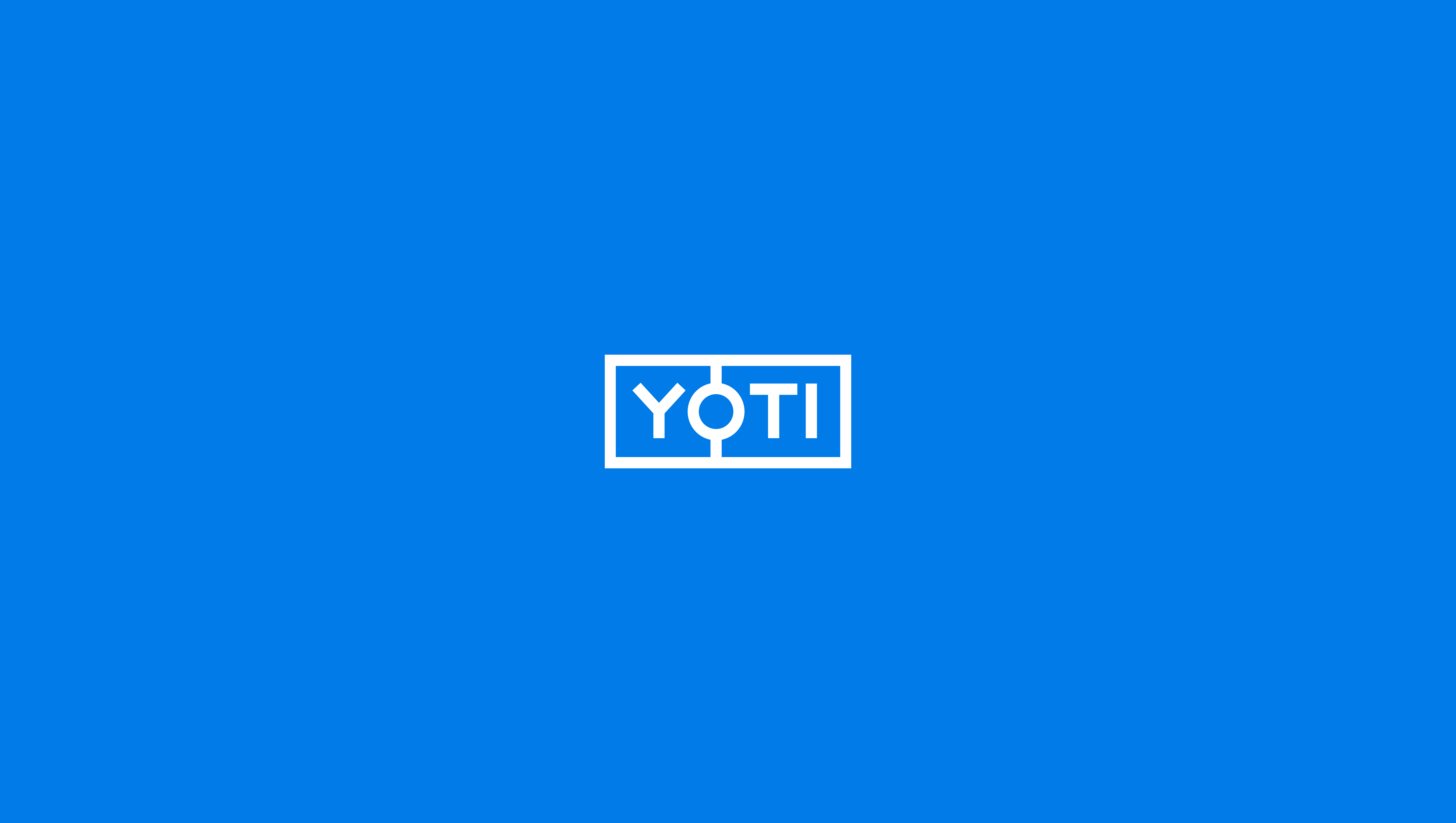 Yoti trials blockchain in property transactions with HM Land Registry Yoti logo on blue background
