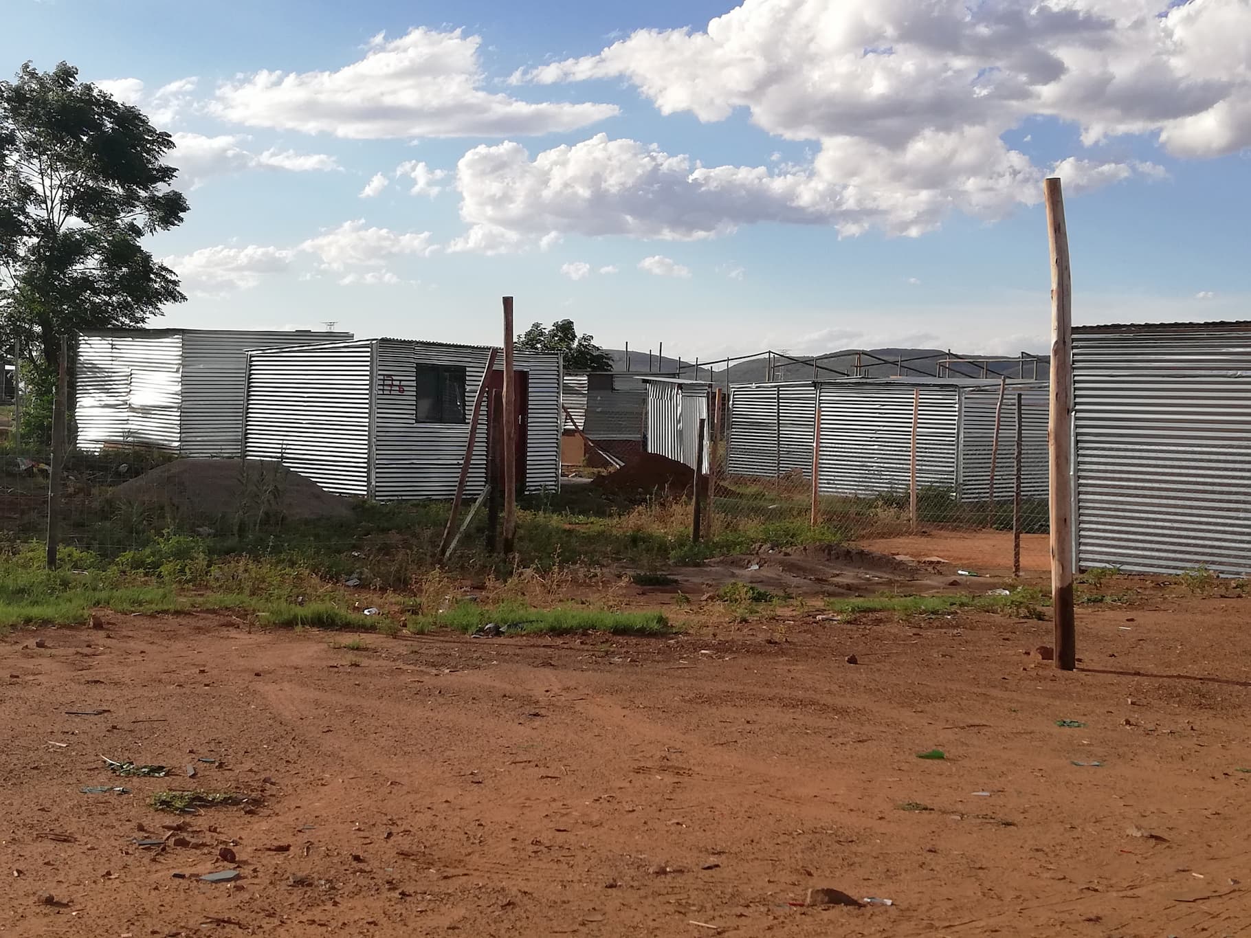 Small dwellings made from corrugated metal in South Africa