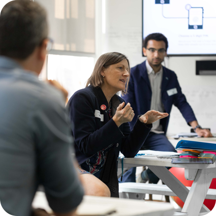 Julie Dawson talking to room of people