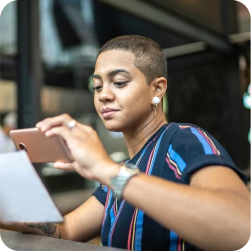 Woman scanning a document with her smartphone