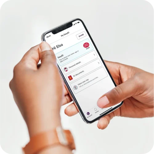 Person holding phone open on the easyID home screen