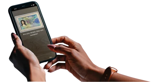 Hands holding a phone which has just photographed their driving licence for an identity check