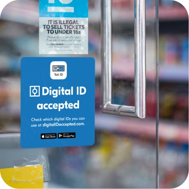 Sticker on shop door showing that they accept digital ID as proof of identity and age