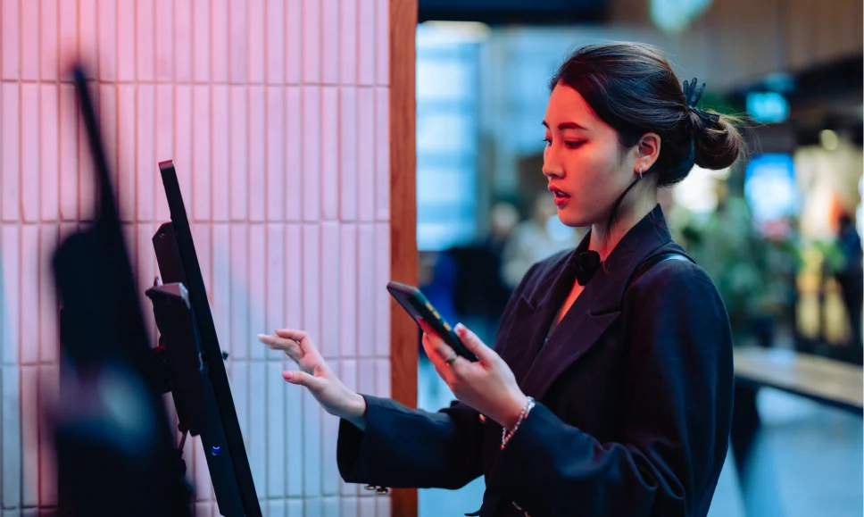 Person using Yoti at self checkout