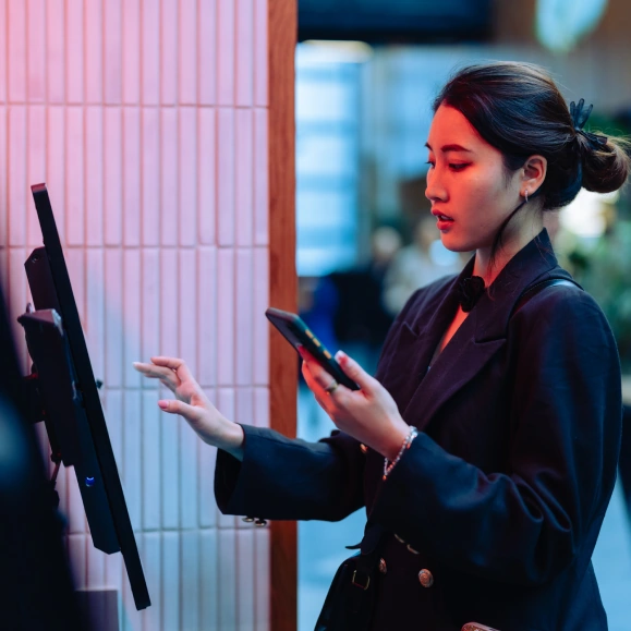 Person using Yoti at self checkout